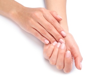 Woman with beautiful hands on white background, closeup. Spa treatment