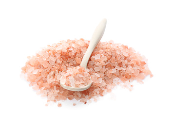 Photo of Pile and spoon of pink himalayan salt isolated on white