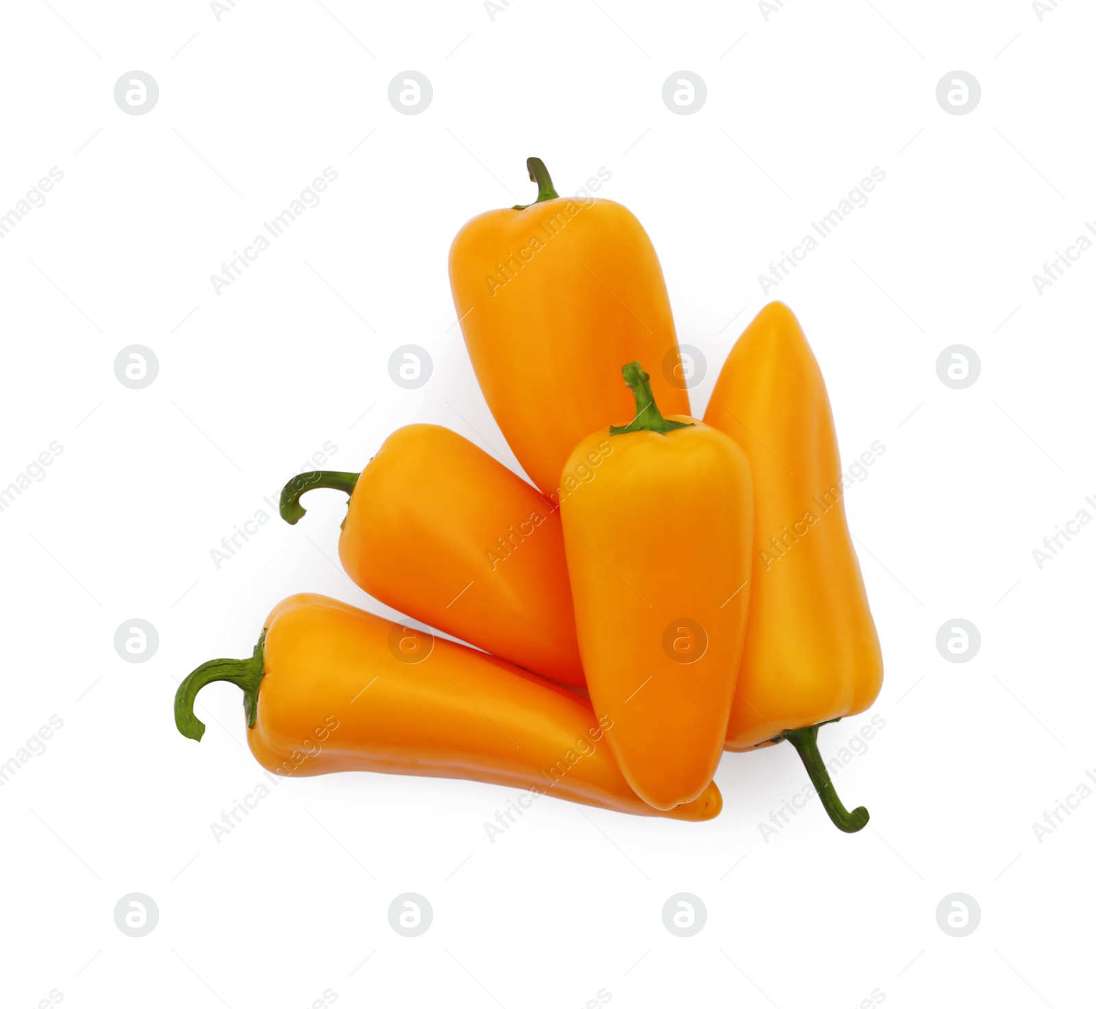 Photo of Fresh raw orange hot chili peppers on white background, top view