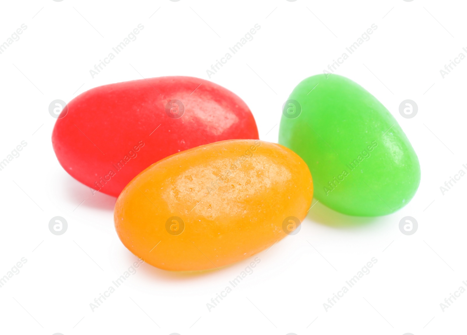 Photo of Delicious colorful jelly beans isolated on white