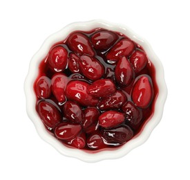 Delicious dogwood jam with berries in bowl isolated on white, top view