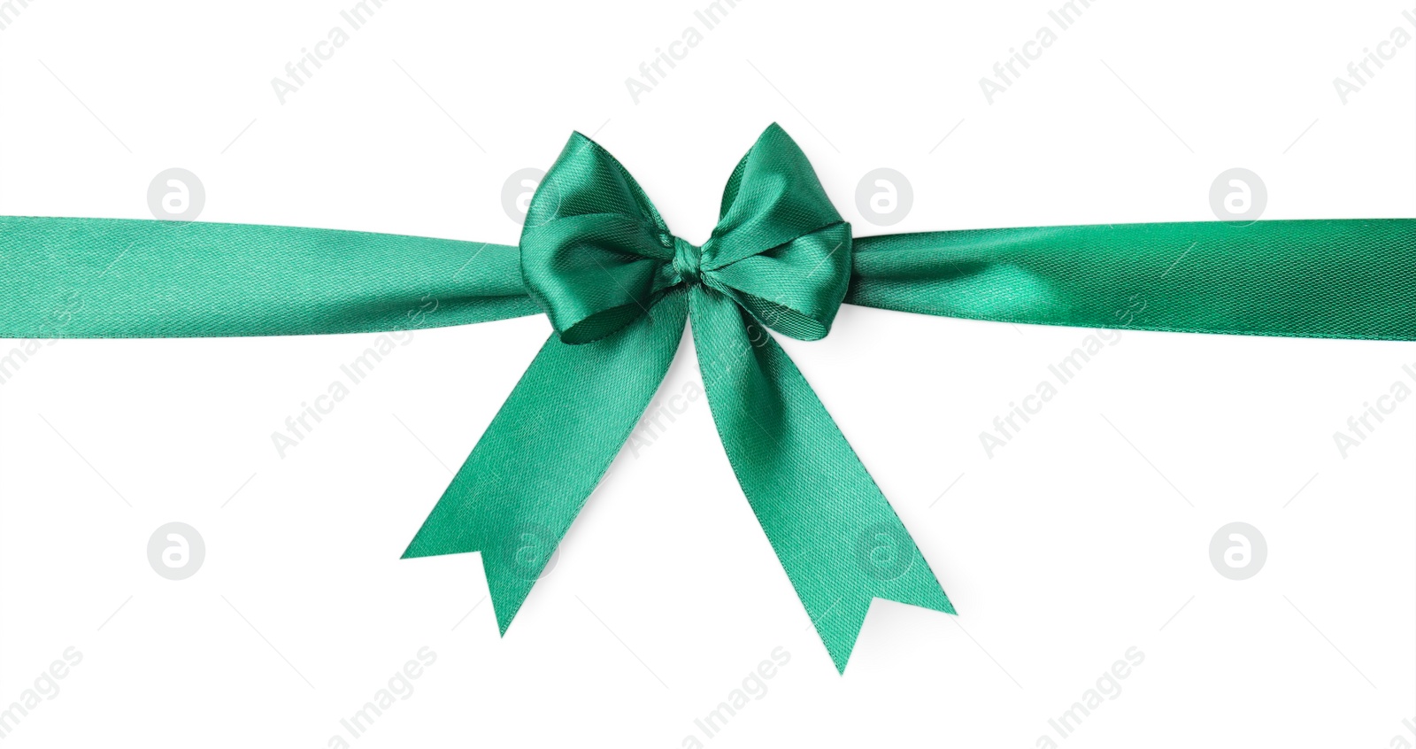 Photo of Green satin ribbon with bow isolated on white, top view