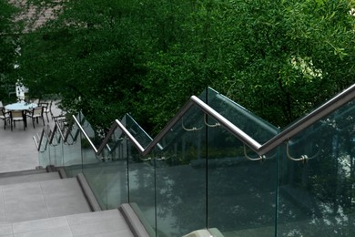 Outdoor staircase with metal handrails in park
