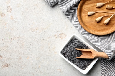 Photo of Flat lay composition with poppy seeds on grey background