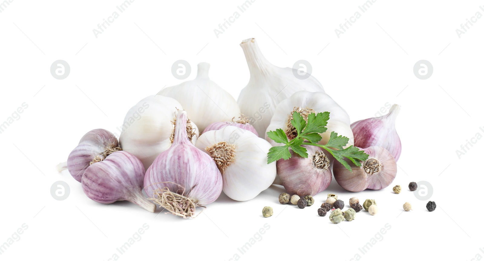 Photo of Fresh garlic heads and spices isolated on white