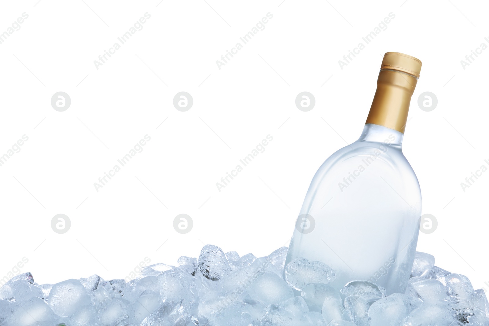 Photo of Ice cubes and bottle of vodka on white background