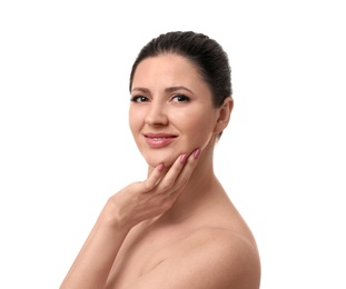 Photo of Beautiful woman with clean skin touching her face on white background