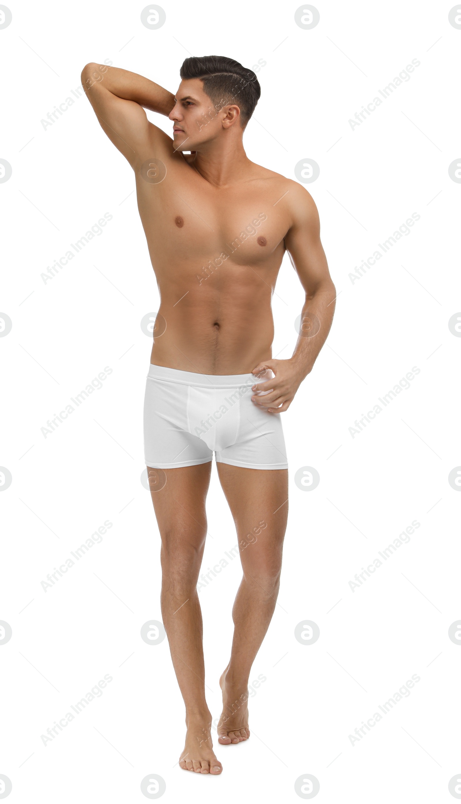 Photo of Handsome man in underwear on white background