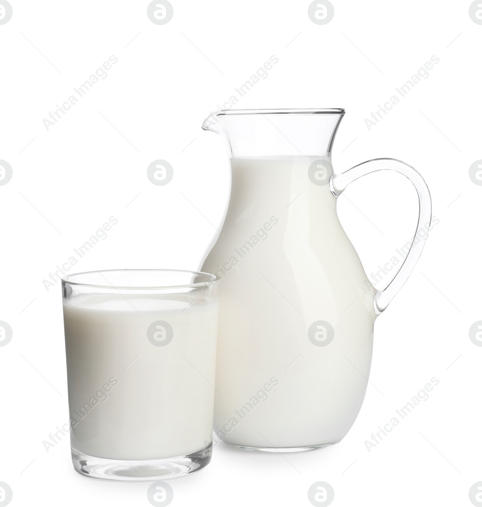 Photo of Glass and jug with milk on white background