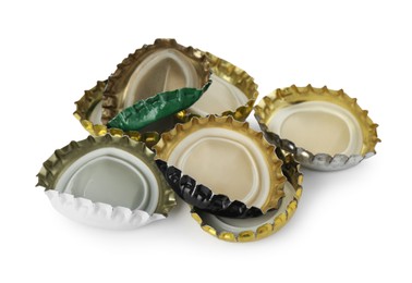 Group of different beer bottle caps isolated on white