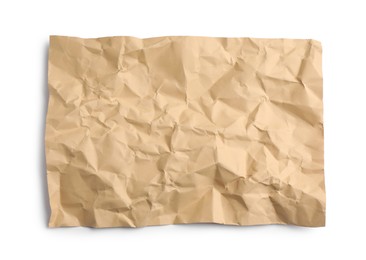 Photo of Sheet of crumpled brown paper on white background, top view