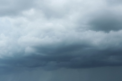 Sky with heavy rainy clouds on grey day