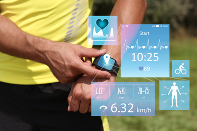 Image of Man using smart watch during training outdoors, closeup. Illustrations near hand with device