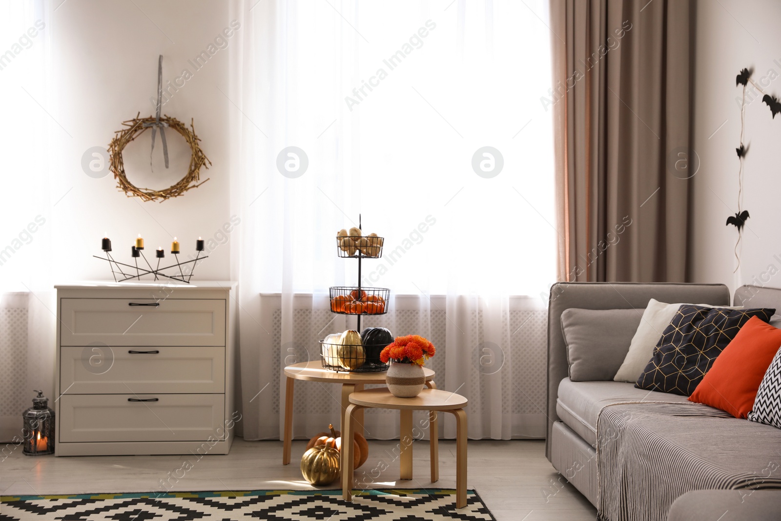 Photo of Modern room decorated for Halloween. Festive interior