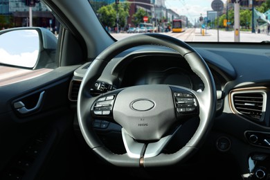 Image of Steering wheel and dashboard in modern car