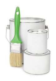 Photo of Closed blank cans of paint and brush on white background