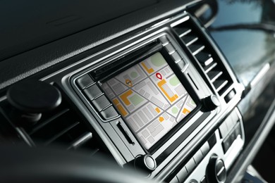 Closeup view of dashboard with navigation system in modern car