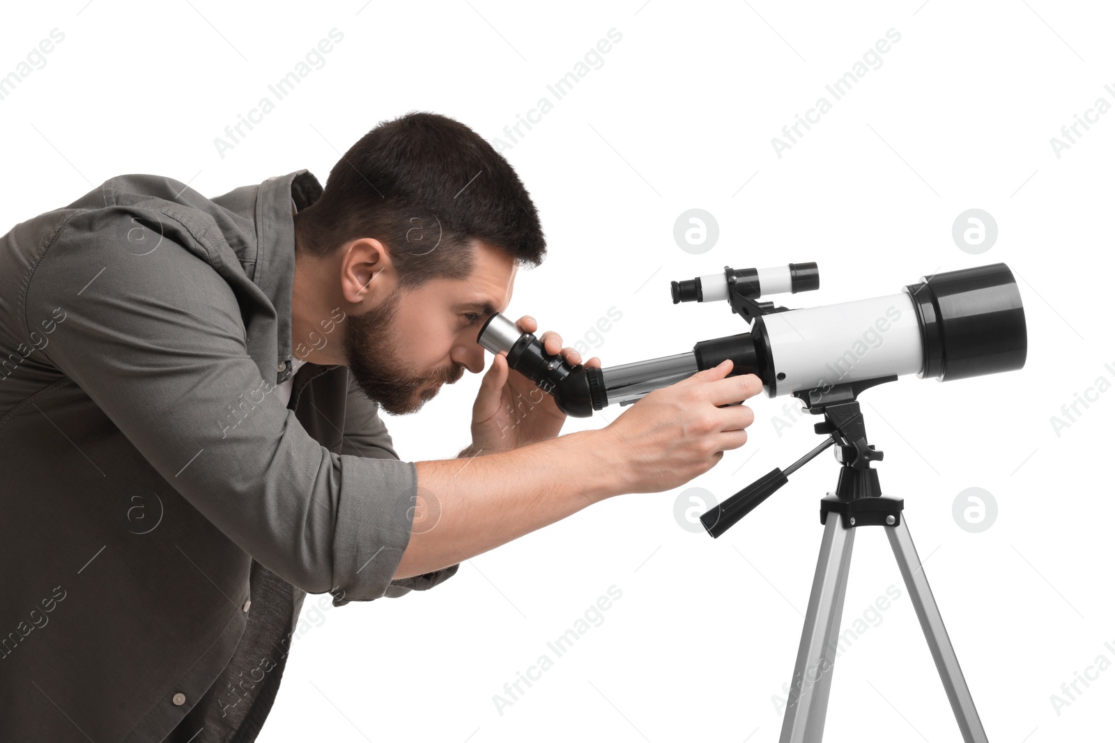 Photo of Astronomer looking at stars through telescope on white background