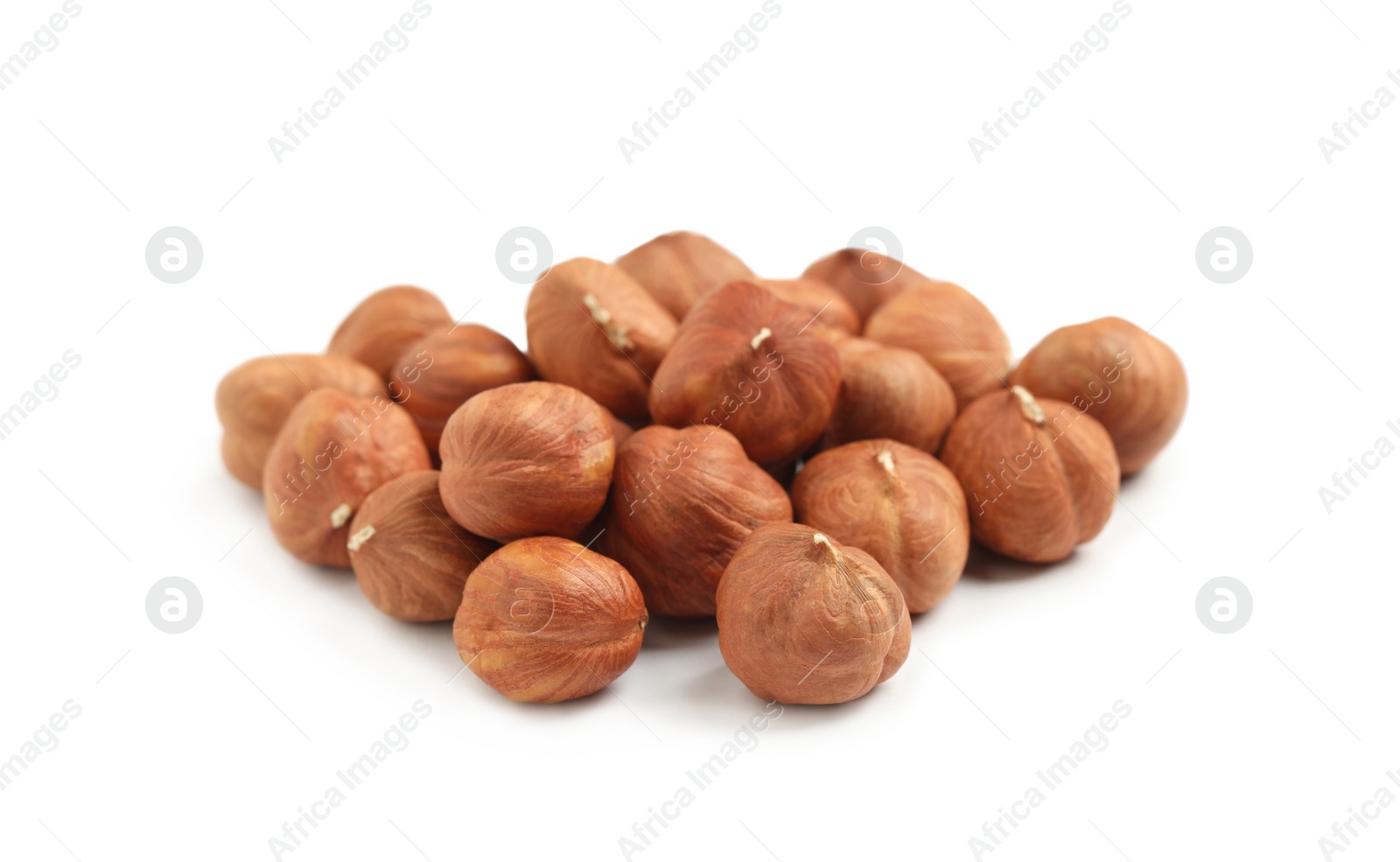 Photo of Heap of tasty hazelnuts on white background