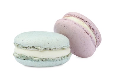 Photo of Different delicious colorful macarons on white background