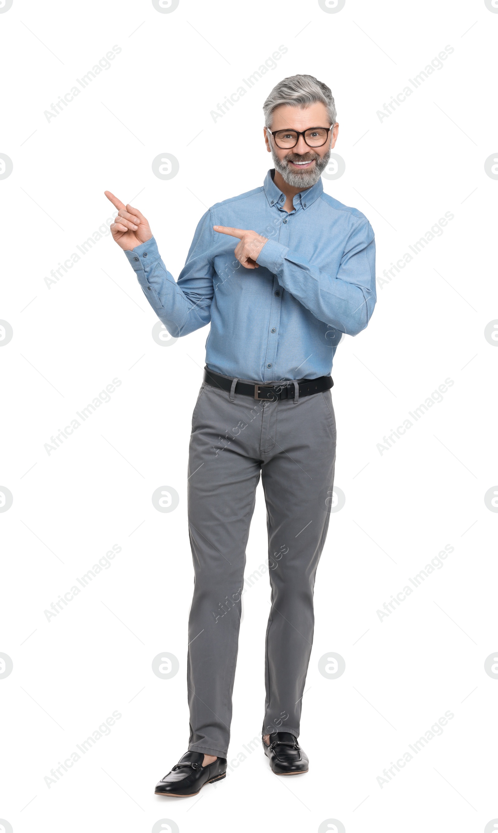 Photo of Mature businessman in stylish clothes posing on white background