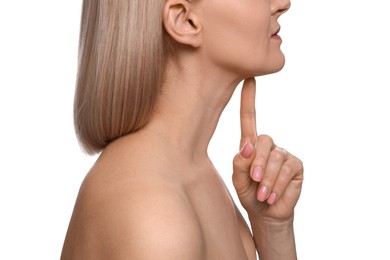 Woman touching her chin on white background, closeup