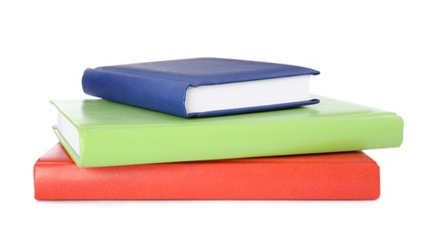Stack of stylish notebooks on white background