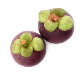 Photo of Delicious ripe mangosteen fruits on white background, above view