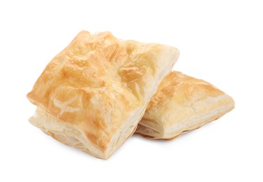 Photo of Delicious fresh puff pastries isolated on white