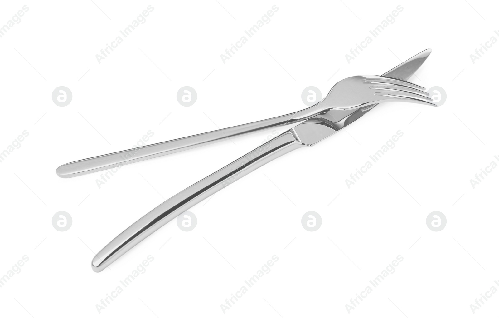 Photo of Fork and knife isolated on white. Stylish shiny cutlery set