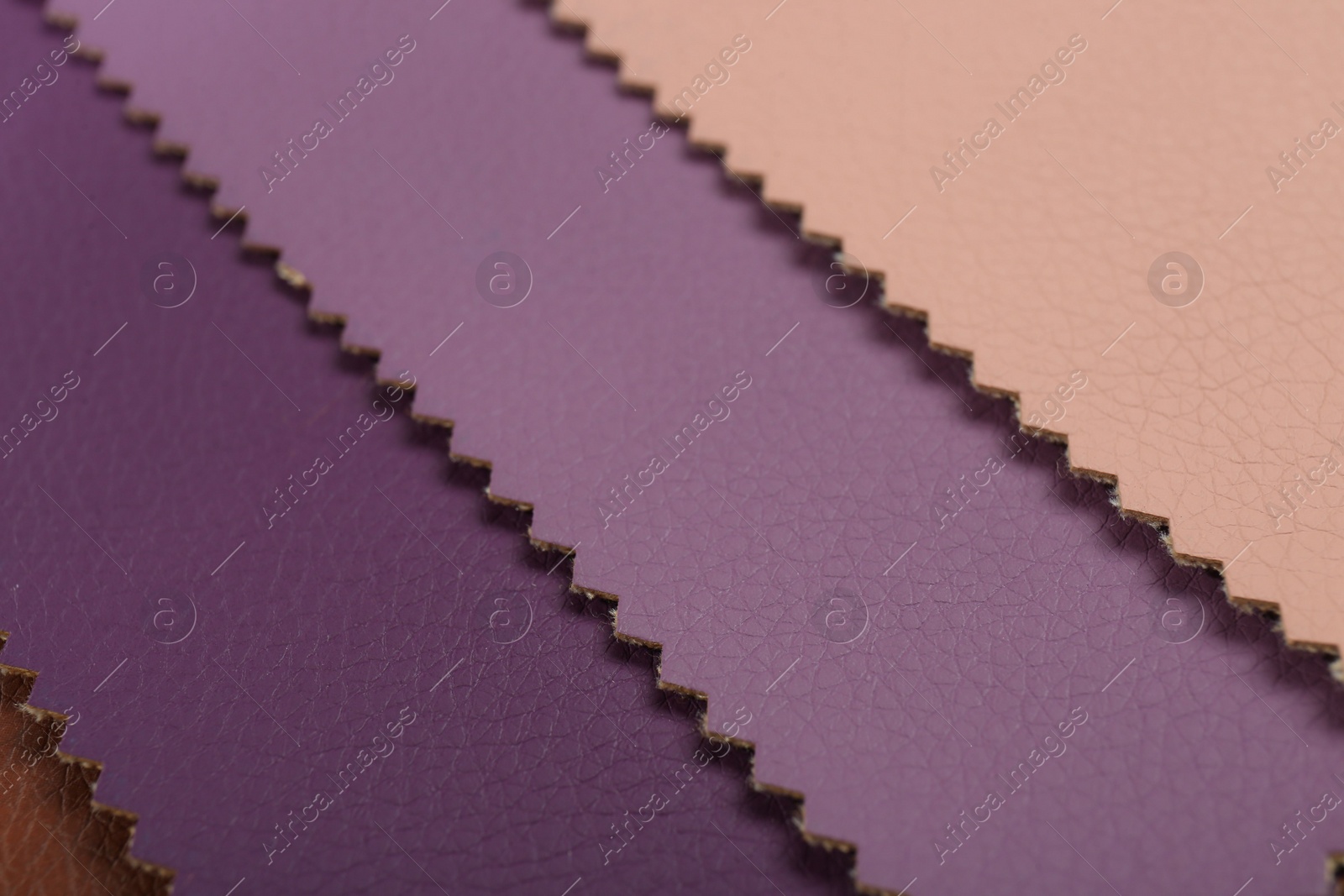 Photo of Different colorful types of leather as background, closeup view