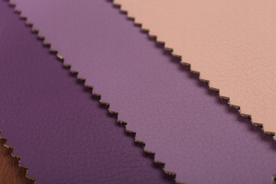 Photo of Different colorful types of leather as background, closeup view