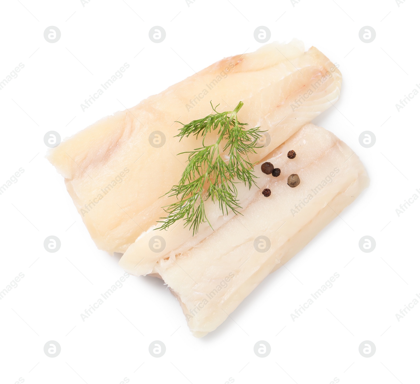 Photo of Pieces of raw cod fish, dill and peppercorns isolated on white, top view