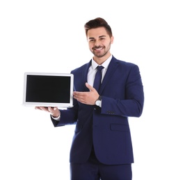 Photo of Young man with laptop on white background. Space for text