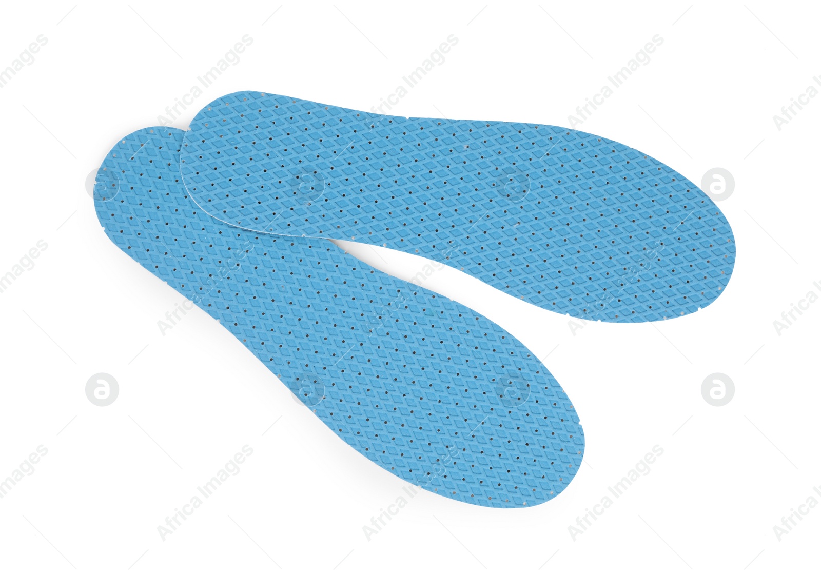 Photo of Pair of insoles on white background, top view