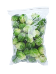 Photo of Plastic bag with frozen brussel sprouts on white background, top view. Vegetable preservation