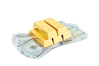 Shiny gold bars and dollar bills on white background