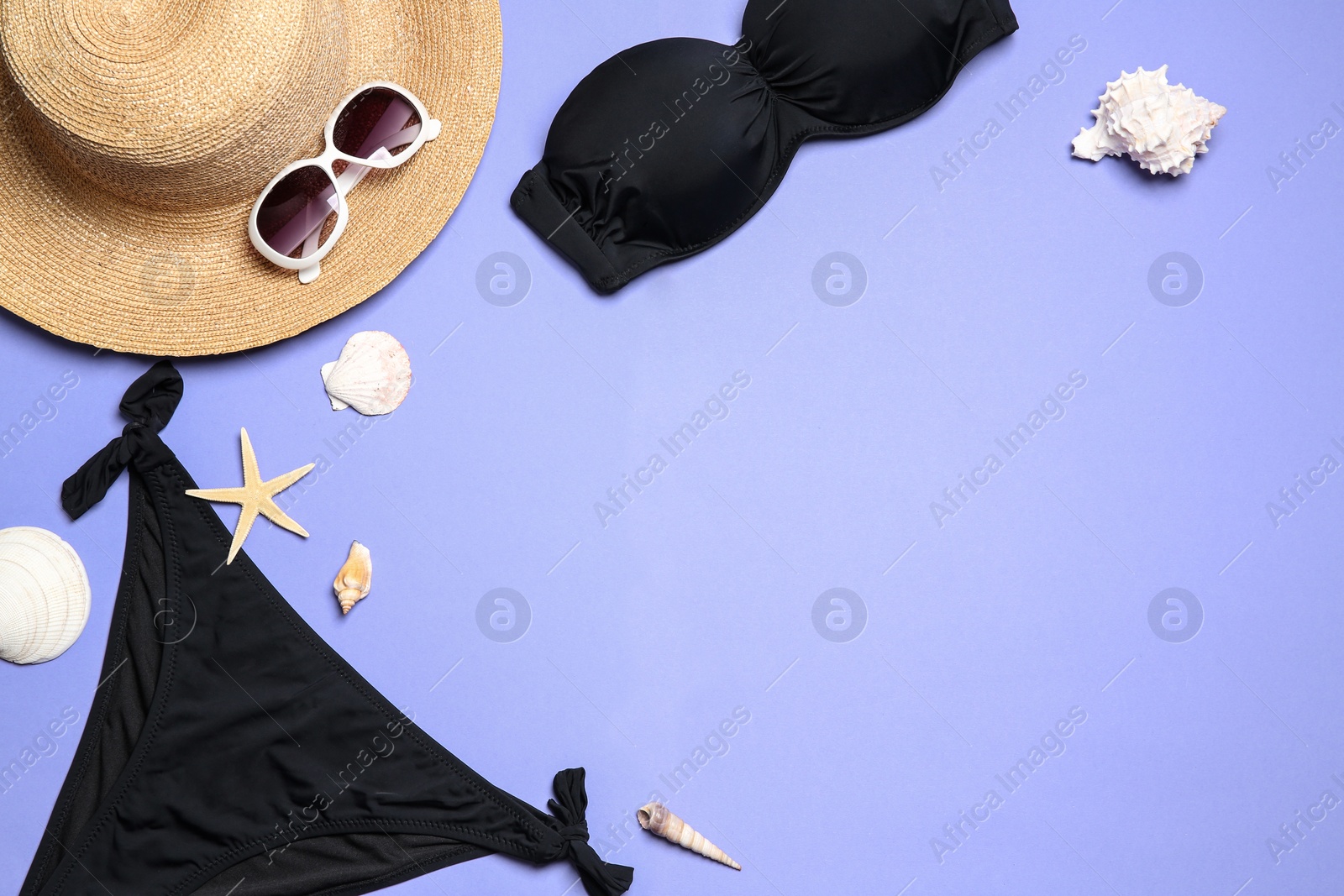 Photo of Flat lay composition with stylish bikini on color background. Space for text