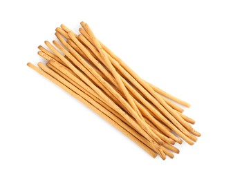Delicious grissini sticks on white background, top view