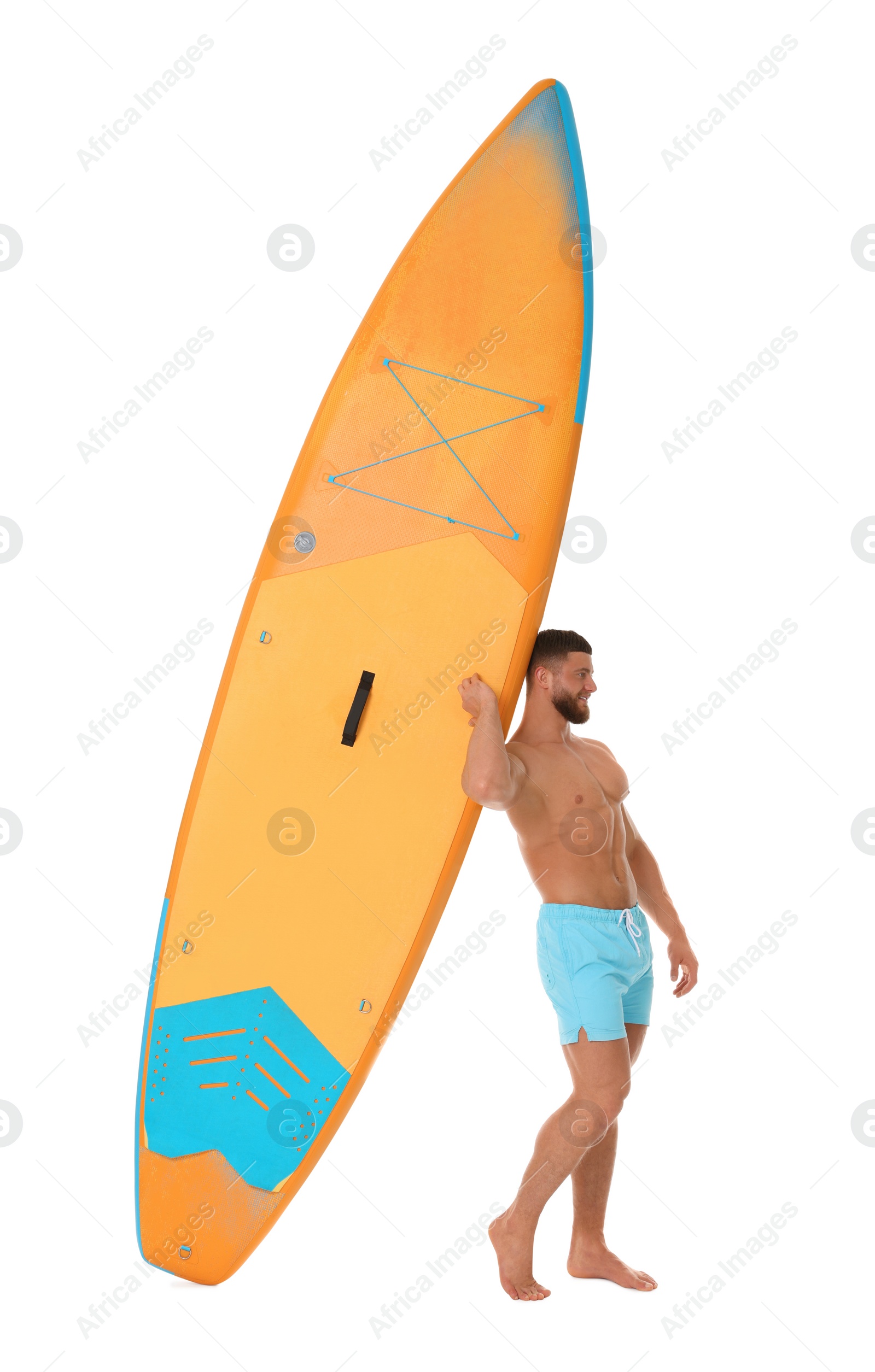 Photo of Handsome man with orange SUP board on white background