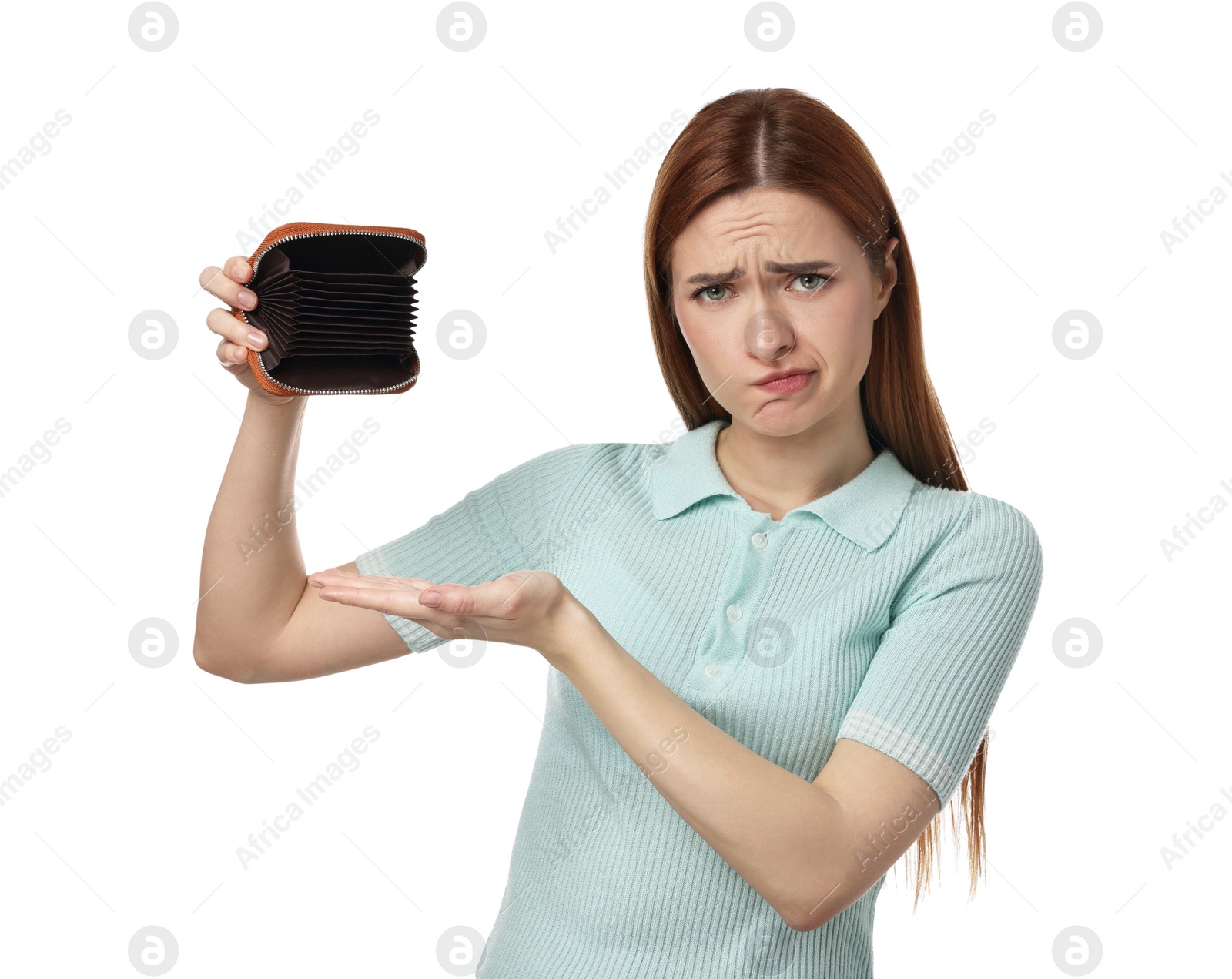 Photo of Upset woman with empty wallet on white background