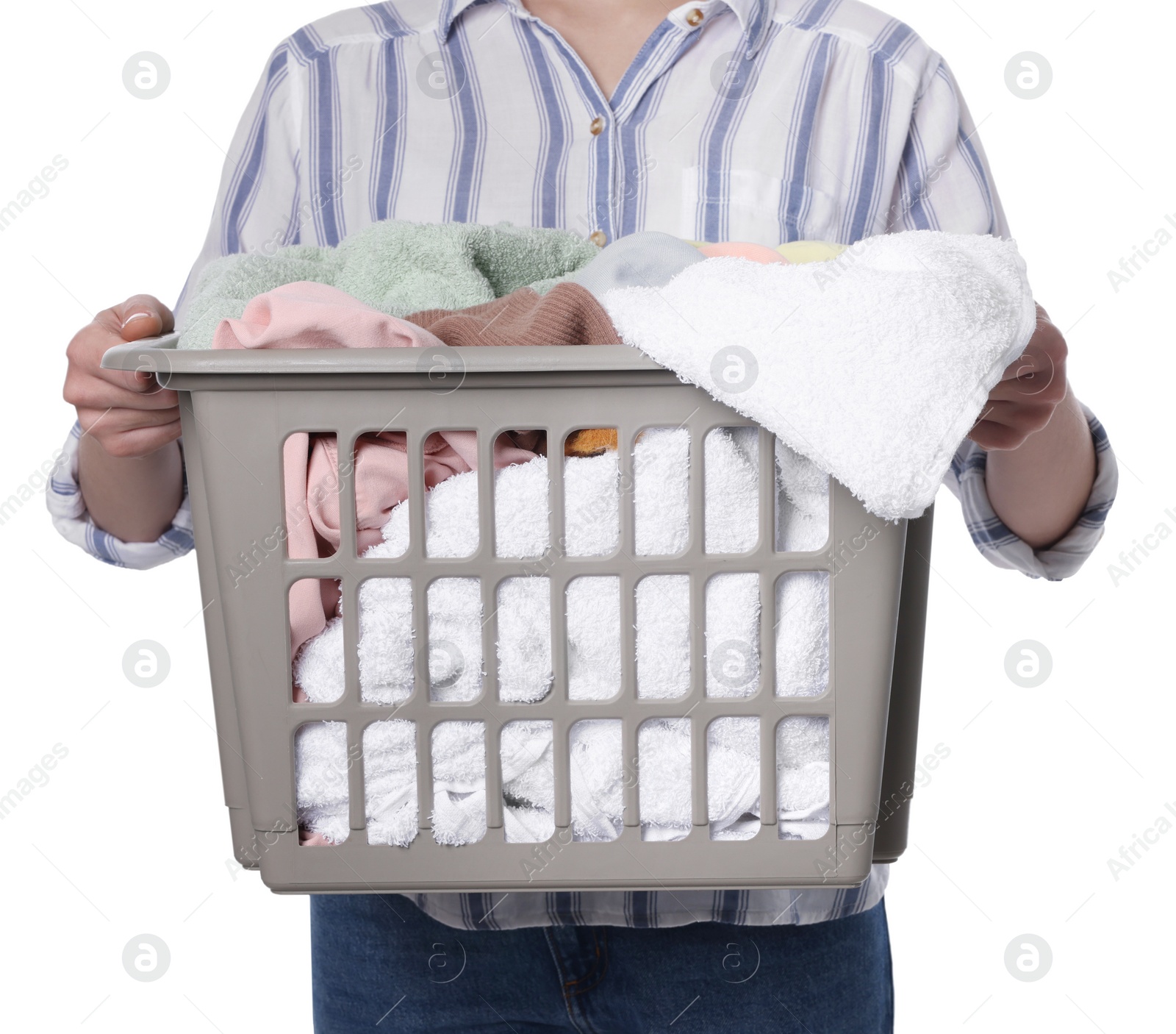 Photo of Woman with basket full of clean laundry on white background, closeup