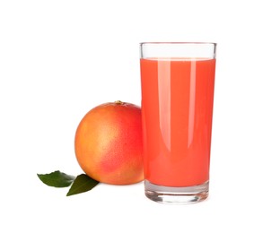 Tasty grapefruit juice in glass, leaves and fresh fruit isolated on white