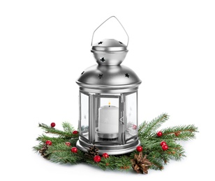 Photo of Decorative Christmas lantern and coniferous twigs on white background