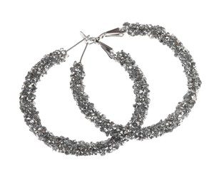 Luxury earrings on white background. Elegant jewelry