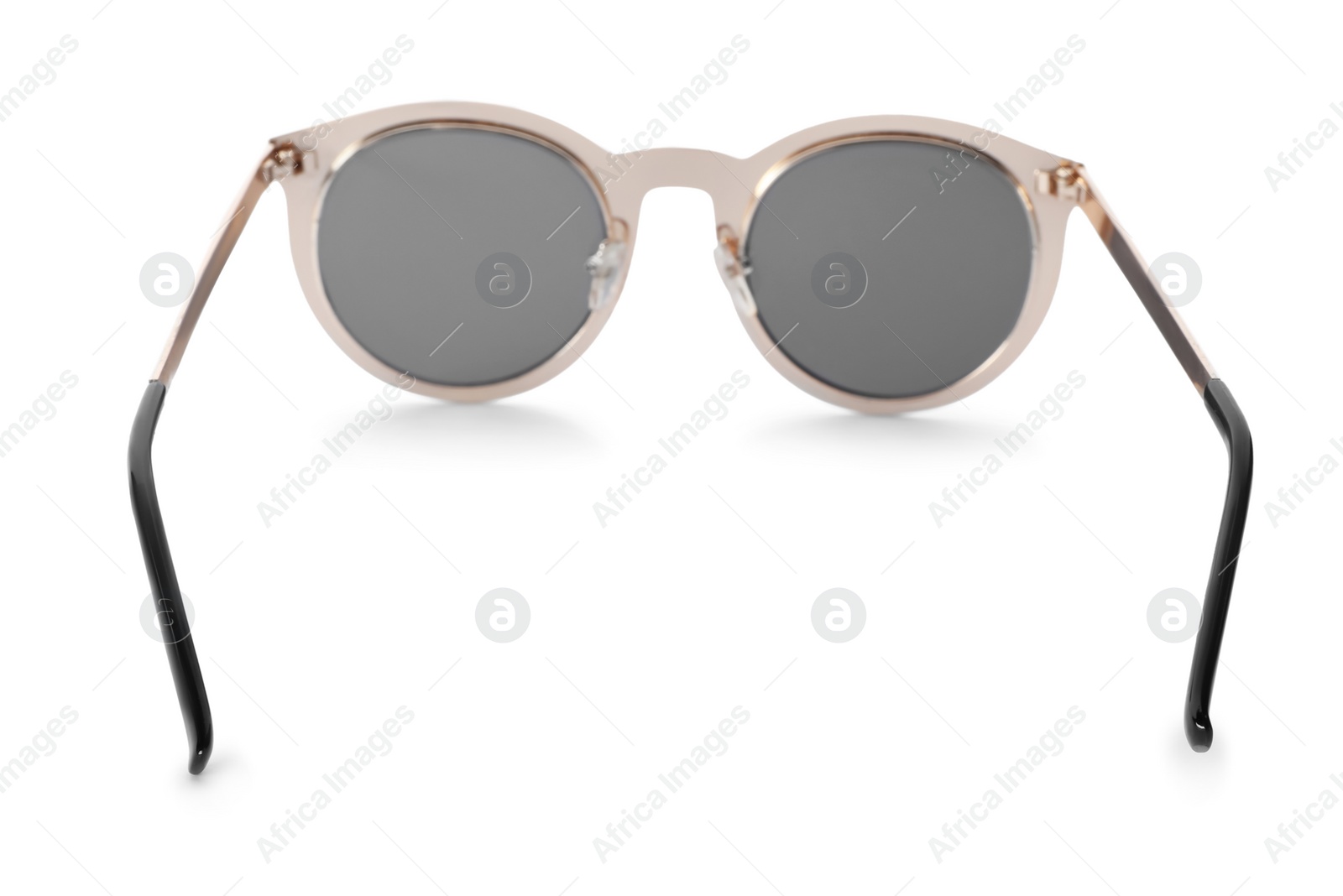 Photo of Beautiful sunglasses on white background. Beach object