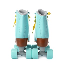 Pair of stylish quad roller skates on white background