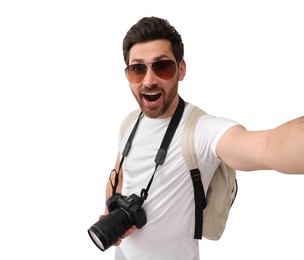 Smiling man with camera taking selfie on white background