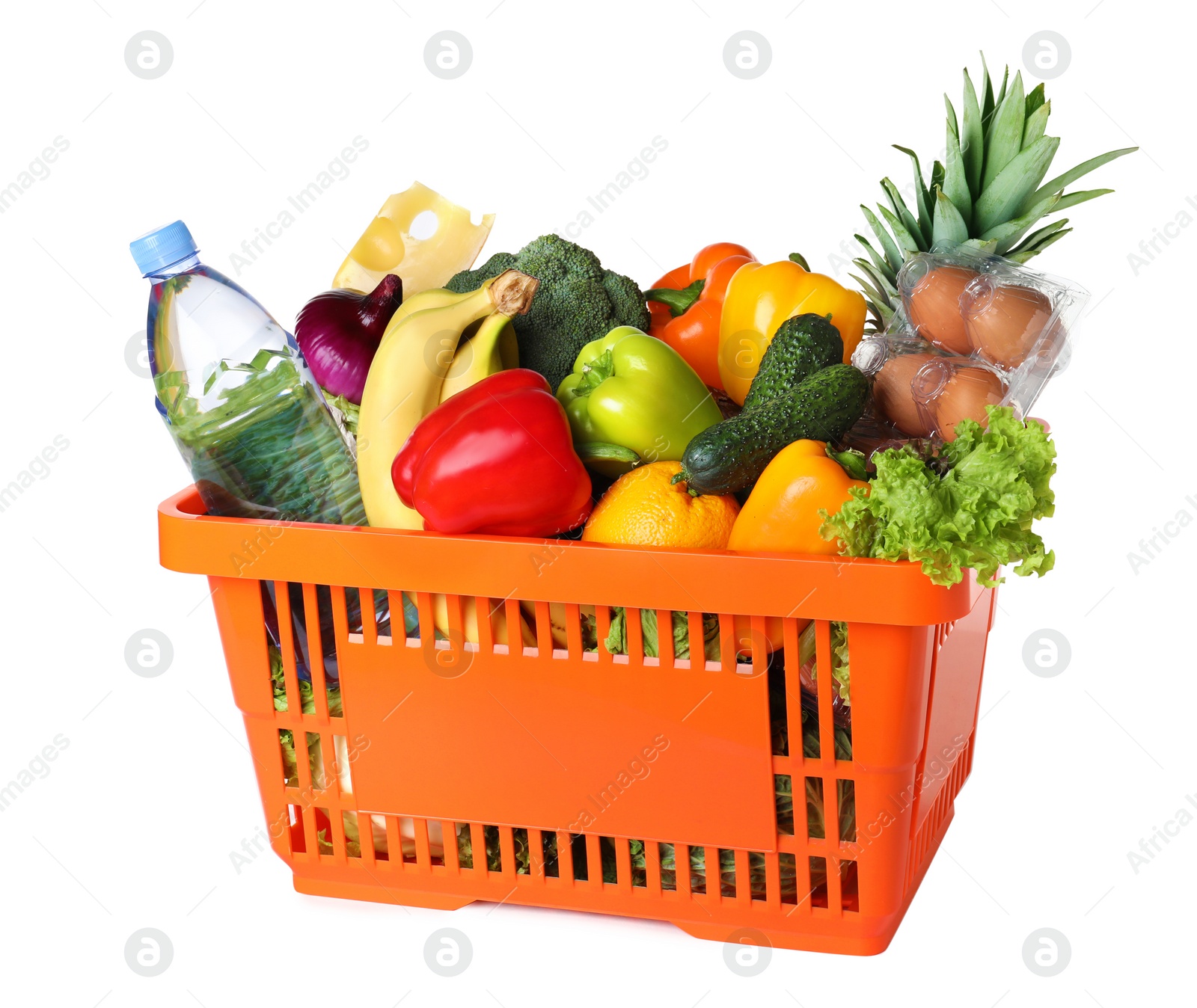 Photo of Shopping basket with grocery products on white background