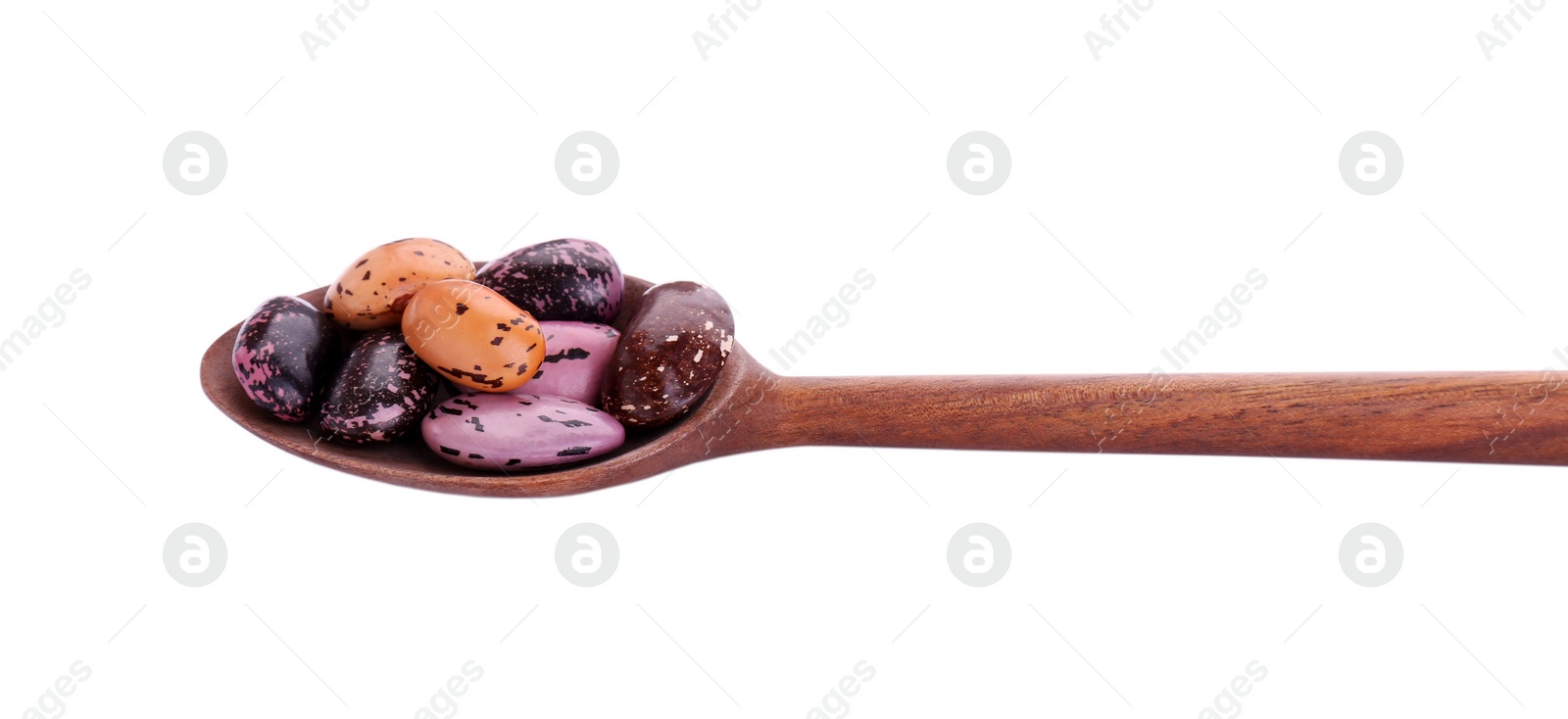 Photo of Wooden spoon with dry kidney beans isolated on white